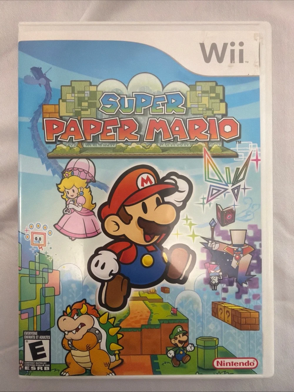 Nintendo Super Paper Mario Wii — Blue, Red, Pink Artwork